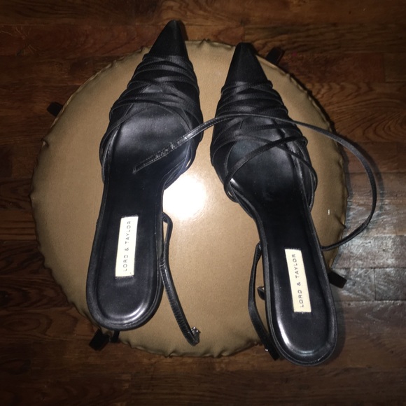 Black satin shoe.