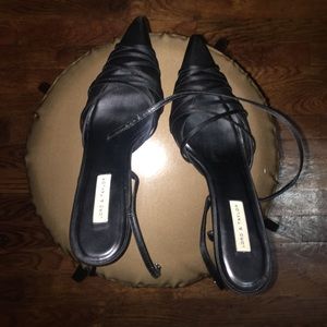 Black satin shoe.