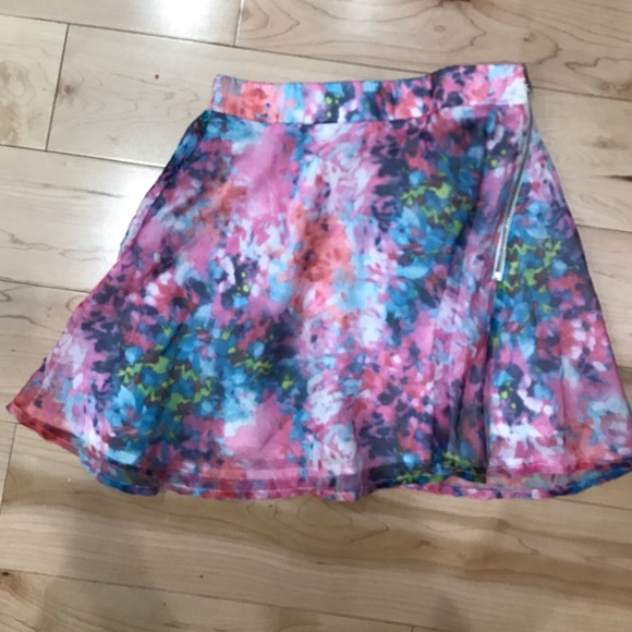 Pink watercolor patterned skirt.