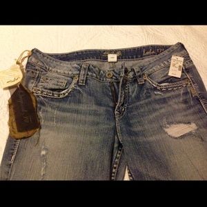 Brand new with tags Silver bootcut jeans!