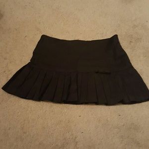 Black pleated mini skirt