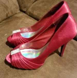 Red high heels with rhinestone jewel