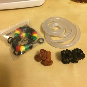 Four pairs size 0g plugs and pinchers