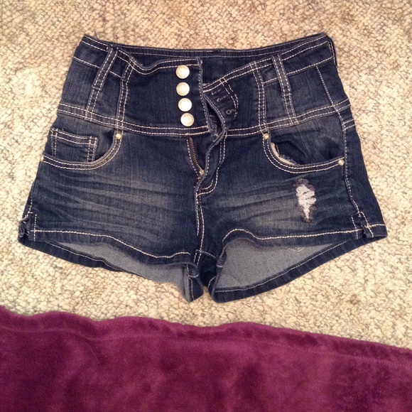 High-waisted dark shorts