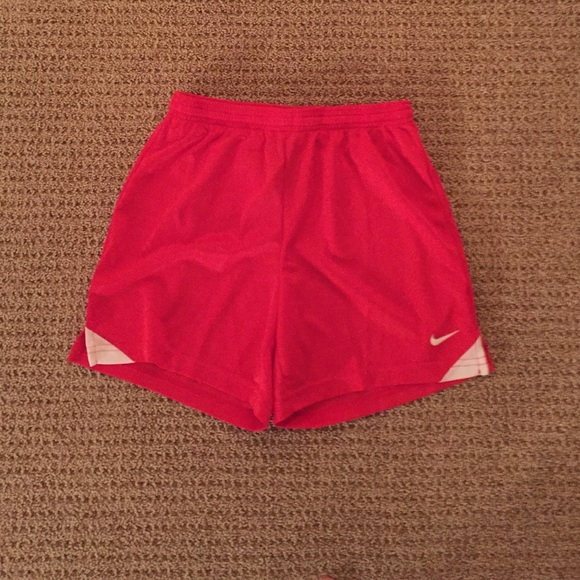 red nike shorts