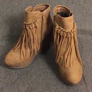 Tan tribal style fringe ankle boots