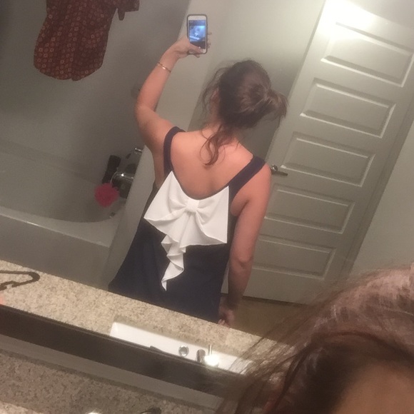 Navy top with white log bow on the back - Picture 1 of 4