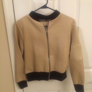 Beige and black bomber jacket