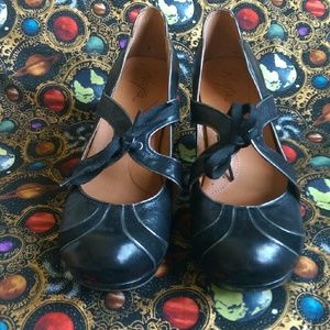 Black leather Mary Jane's.