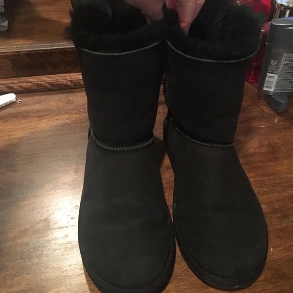 Black uggs with bows up the back! Barely worn!