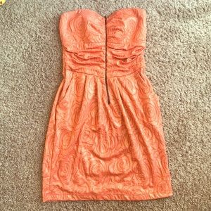 Orange Strapless dress from The Buckle