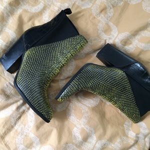 Black and yellow faux snake skin boots