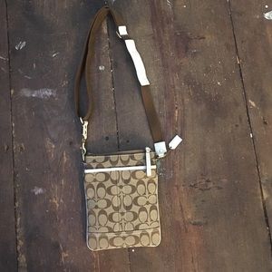 Crossover coach purse