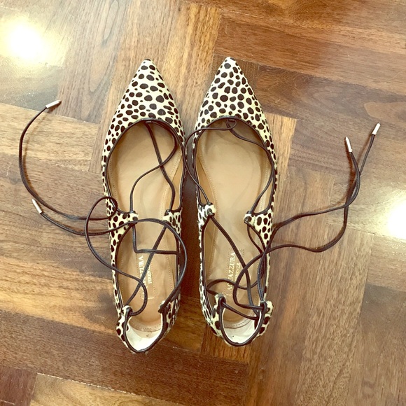 Leopard print tie up flats.