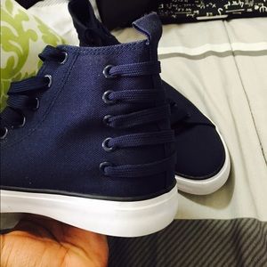 Navy blue high top kicks