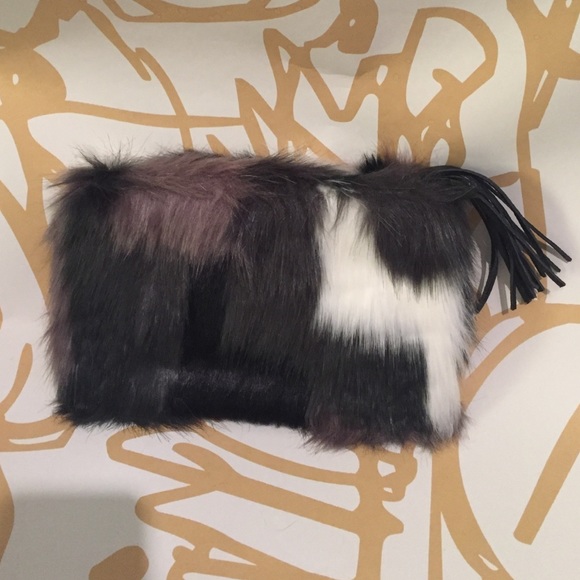 Vera Bradley faux fur tassel clutch