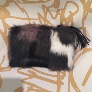 Vera Bradley faux fur tassel clutch