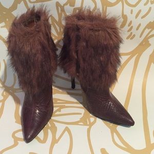 Faux fur and snakeskin boots