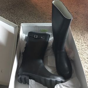 Rain boots, never worn.