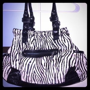 Kathy Van Zeeland zebra print purse