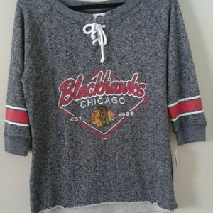 Quarter sleeve lace up black hawks shirt