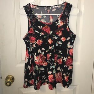 Black tank with floral pattern and mesh accents