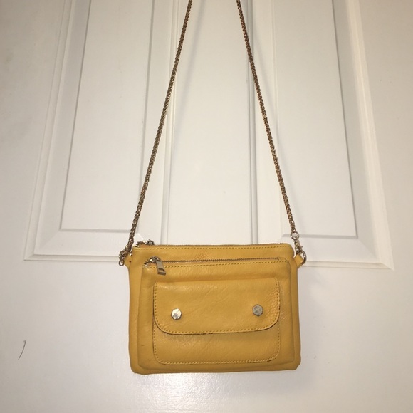Yellow purse with gold metal strap