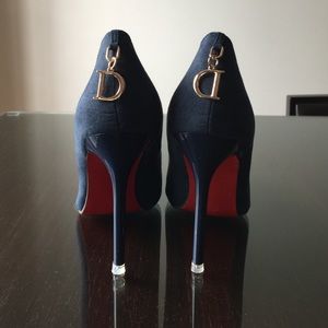 Red bottom pointed heels