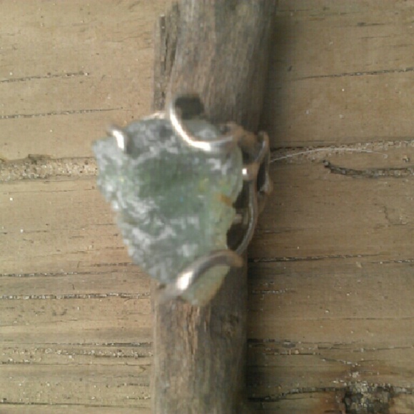 Vintage designer silver ring with green stone.
