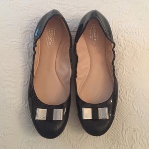 Black patent leather coach flats