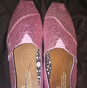 Pink glitter Toms shoes