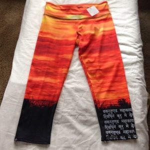 NWT Onzie m/l yoga crop Capri sunset Sanskrit