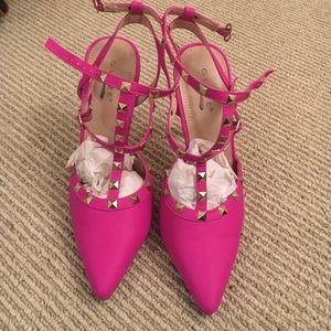Pink heels with gold studs