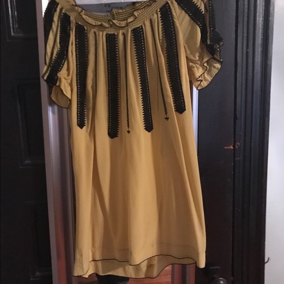 Marigold with black detailing dress.