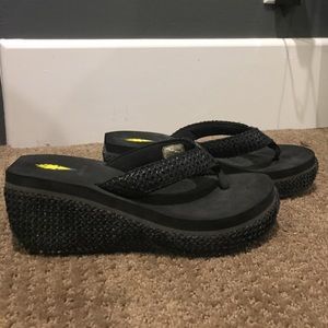 Black wedge Volatile Flip Flops