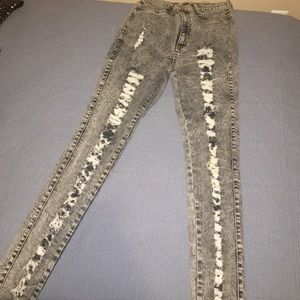 Acid wash destroyed jeans