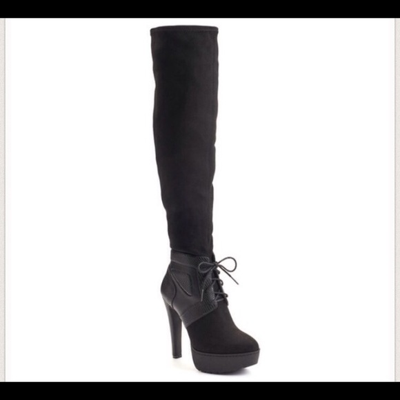 Black over the knee boots Jennifer lopez