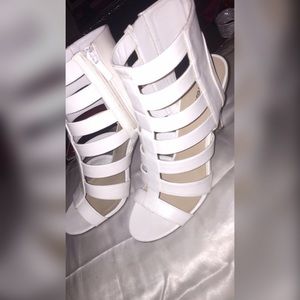 White gladiator heels.