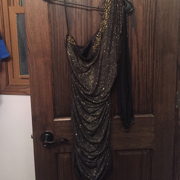One sleeve, open sleeve black with gold sparkle