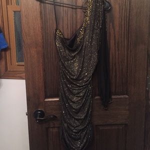 One sleeve, open sleeve black with gold sparkle