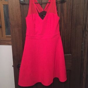 Red dress with mesh straps.