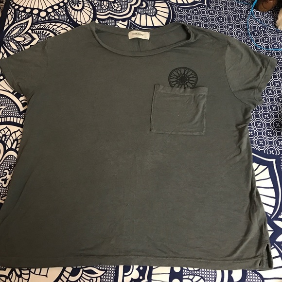 Grey soul cycle t shirt with flywheel over pocket