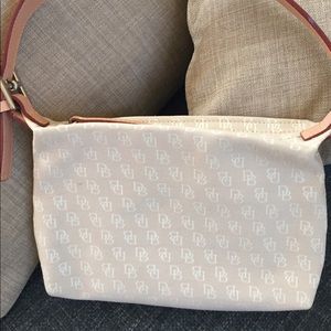 Price firm... amazing Dooney & Bourke cream purse