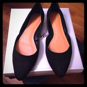 Black suede flats