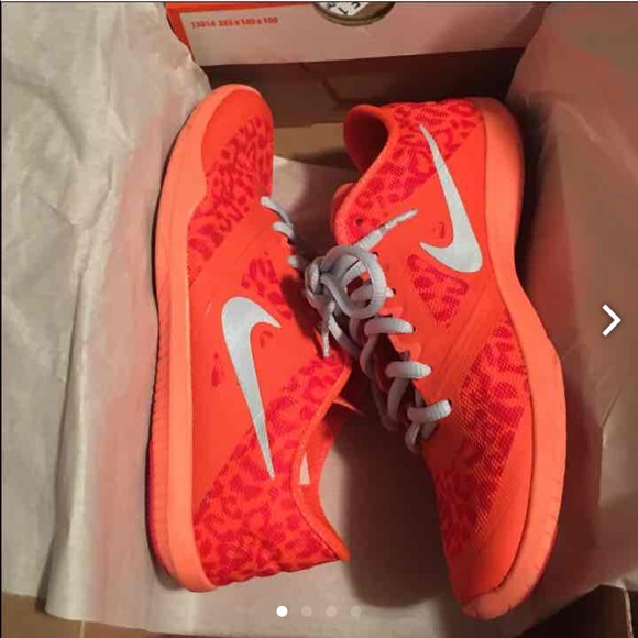 Orange cheetah print Nikes