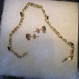 Diamond and sapphire bracelet and earring set.