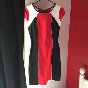 Red black and white curve hugging dress