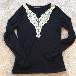 Elegant black and gold top