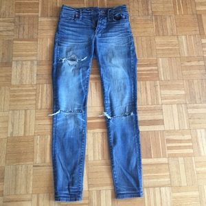 Madewell skinny high rise jeans with ripped knees