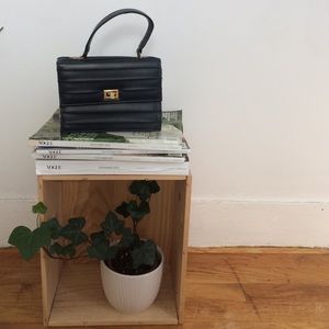 Small vintage navy leather handbag